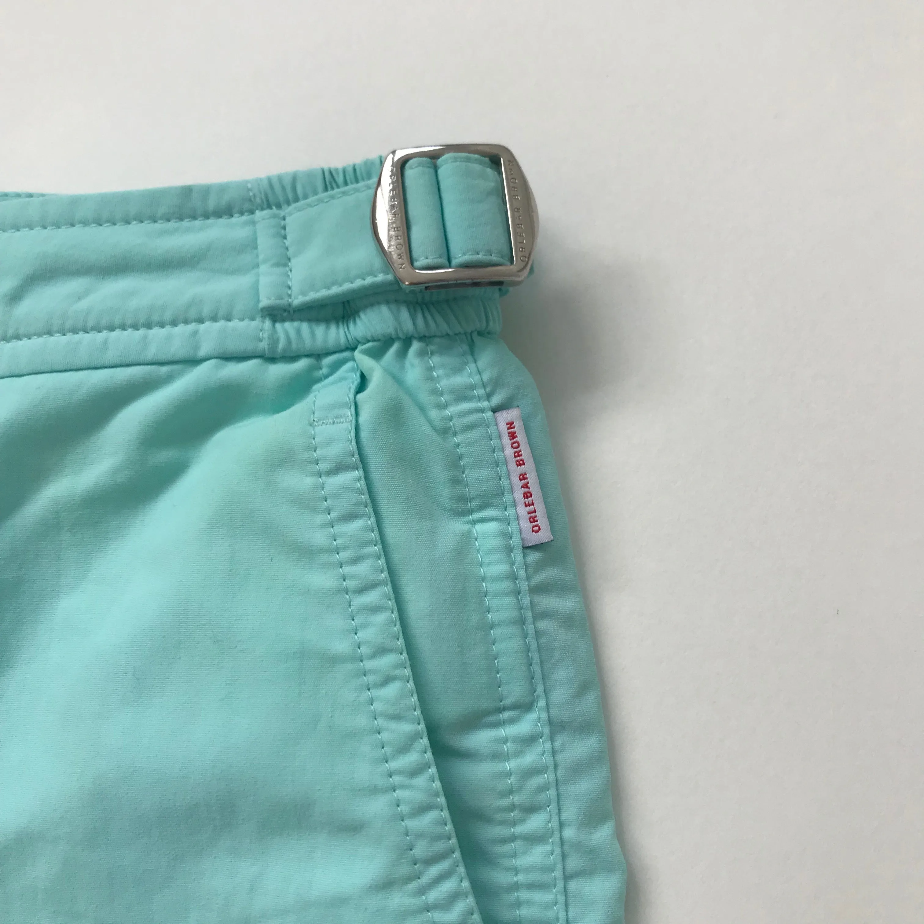 Orlebar Brown Light Turquoise Swim Shorts: 12 Years