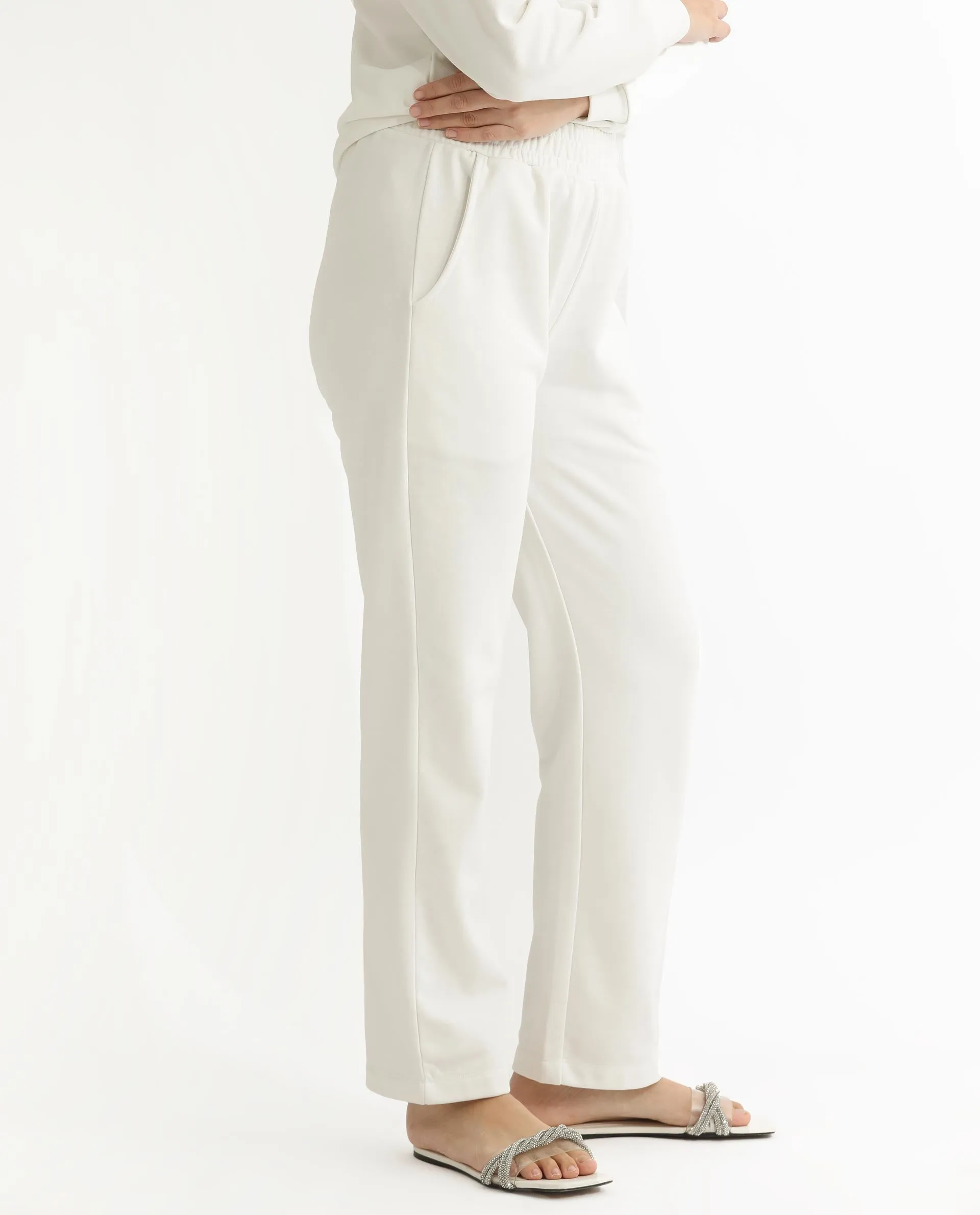 Rareism Women Fronk Off White Poly Cotton Fabric Tailored Fit Solid Mid Rise Ankle Length Track Pant